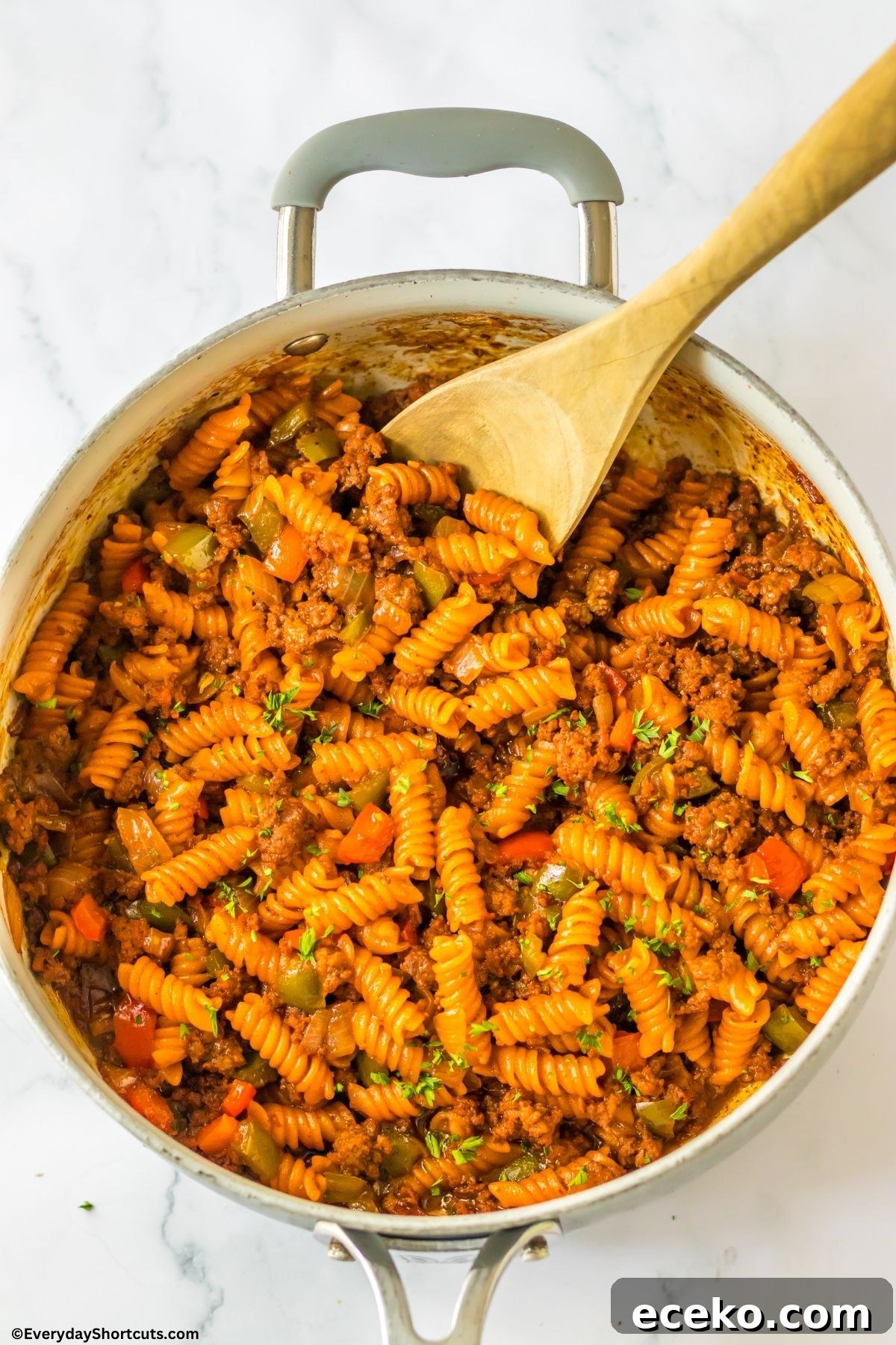 cooked pasta with manwich in a pan