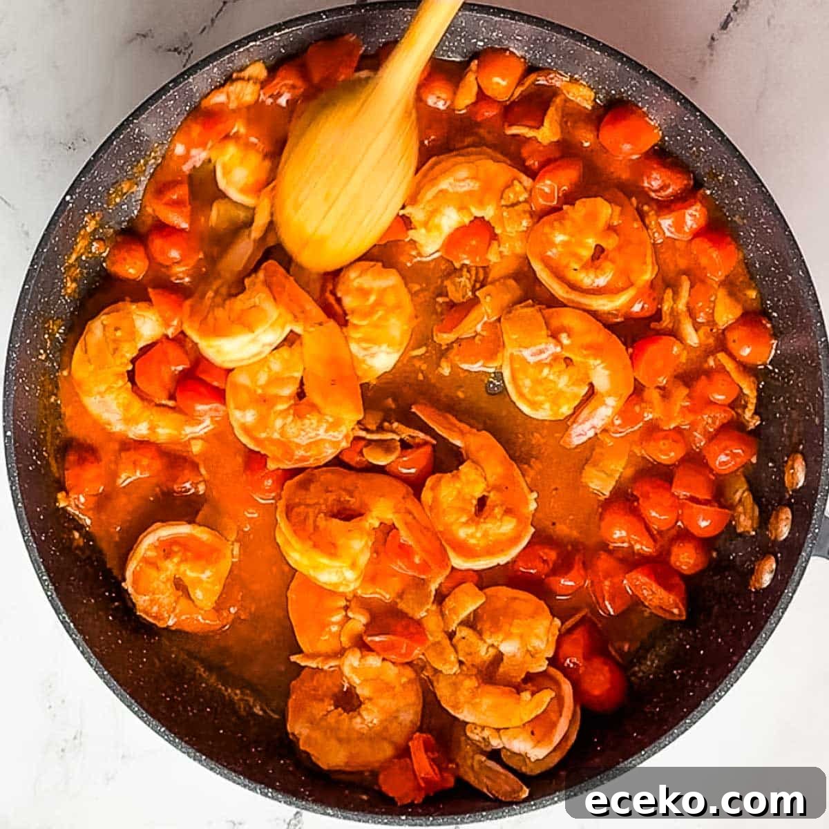 lemon juice stirred into cooked bloody mary shrimp.