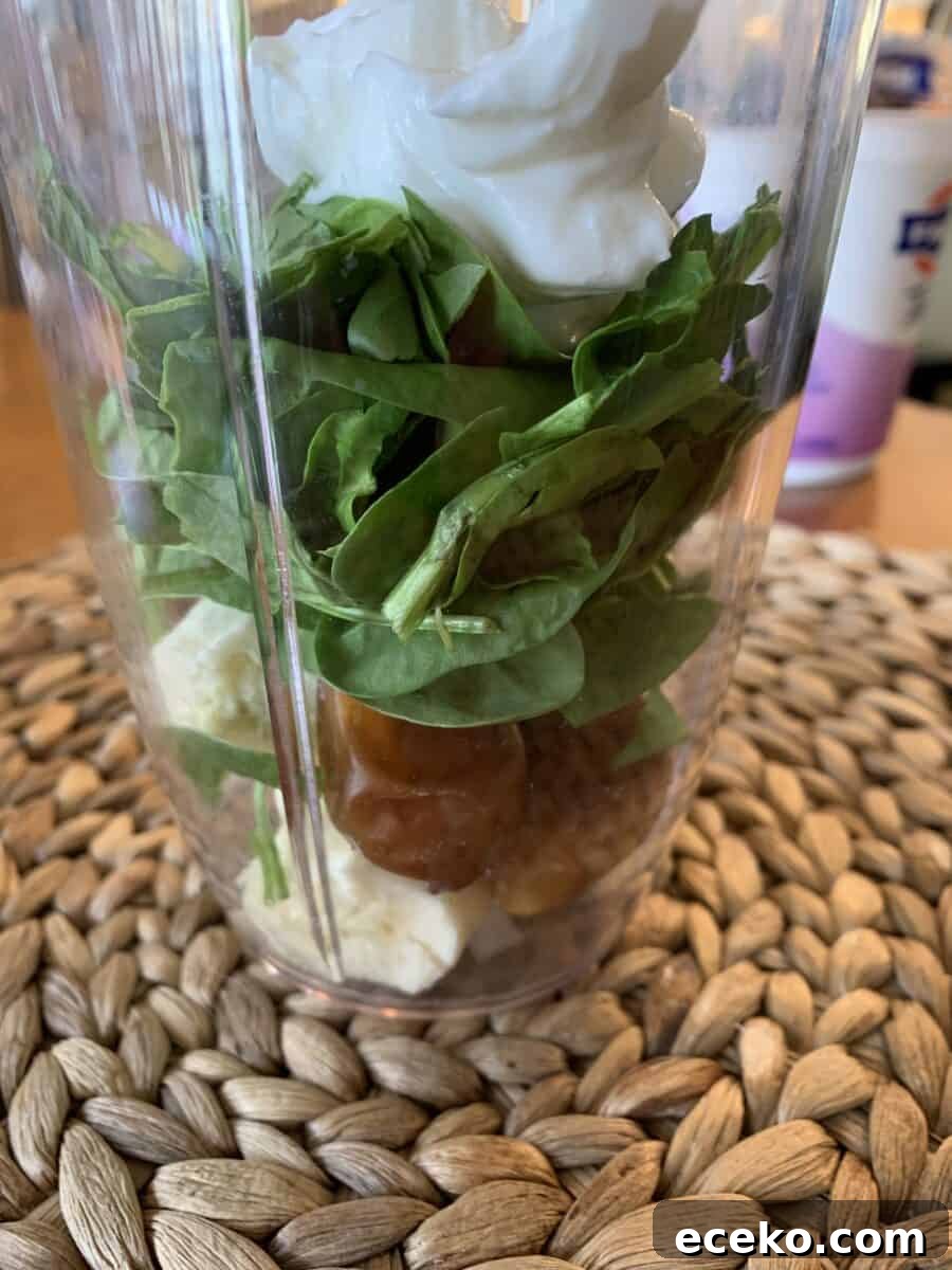 Sweet green smoothie ingredients, including yogurt. 