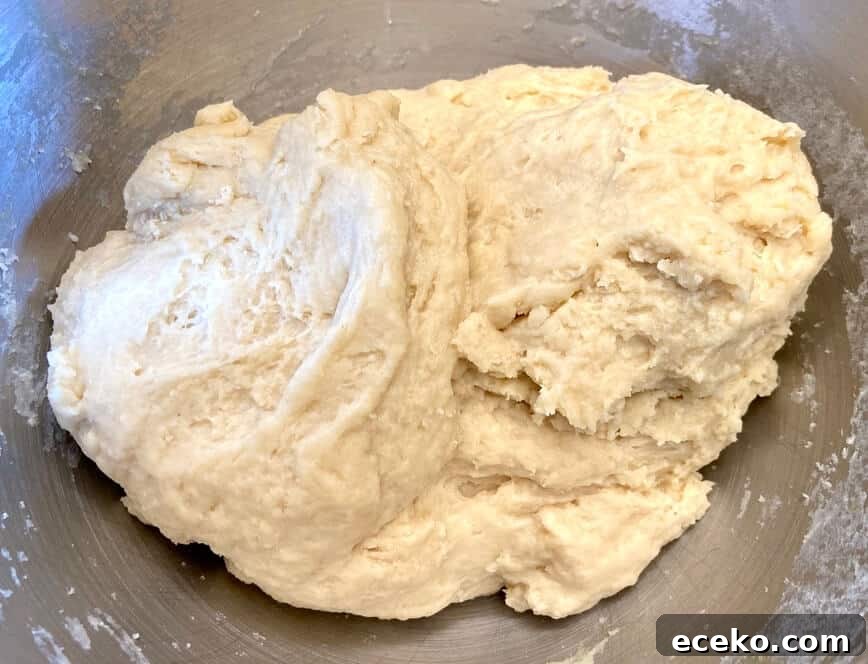 Dough forming together in a bowl.