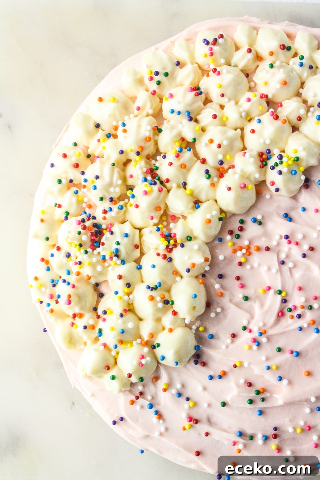 Funfetti Layer Cake with Cream Cheese Frosting Recipe 3 Buttery layer cake with sprinkles and pink frosting!