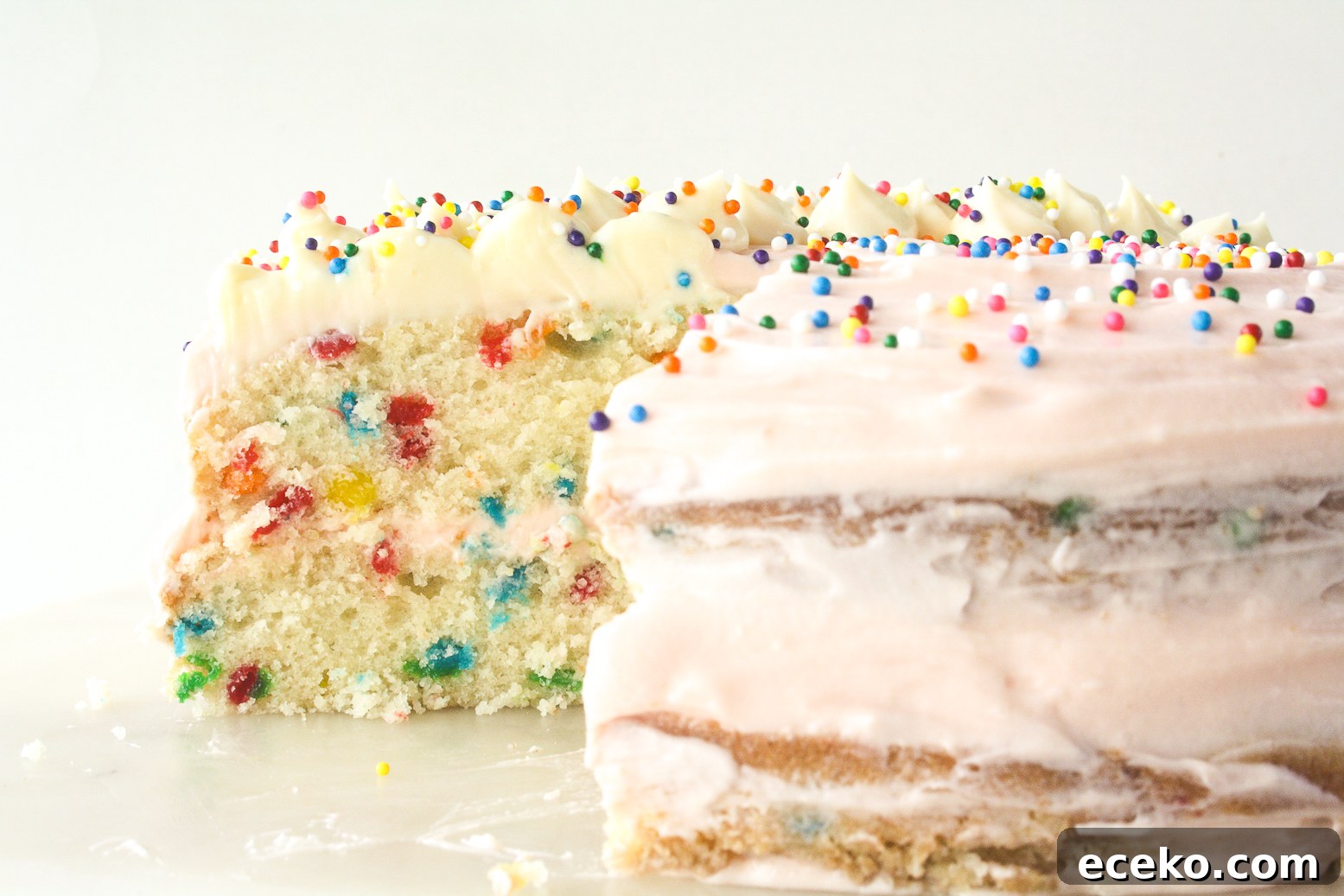 Funfetti Layer Cake with Cream Cheese Frosting Recipe 6 Buttery layer cake with sprinkles and pink frosting!