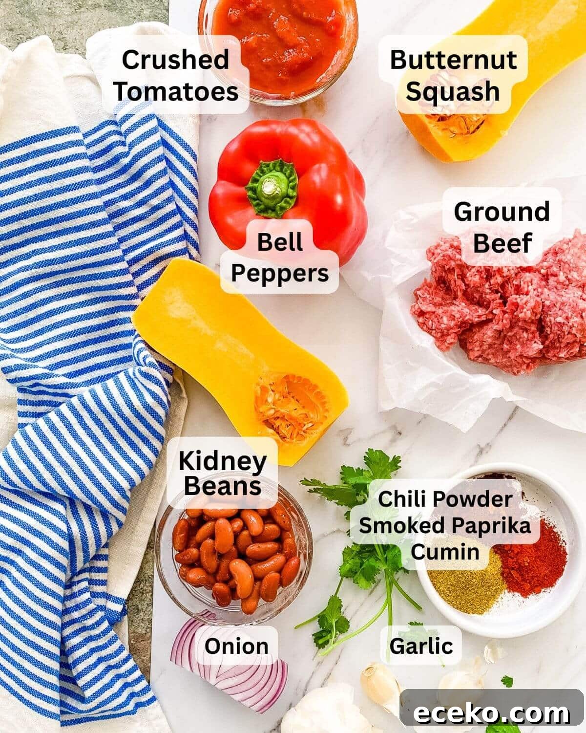 Ingredients needed to make ground beef and butternut squash chili.