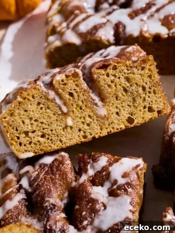 A side view of a piece of Pumpkin Cinnamon Roll Focaccia.