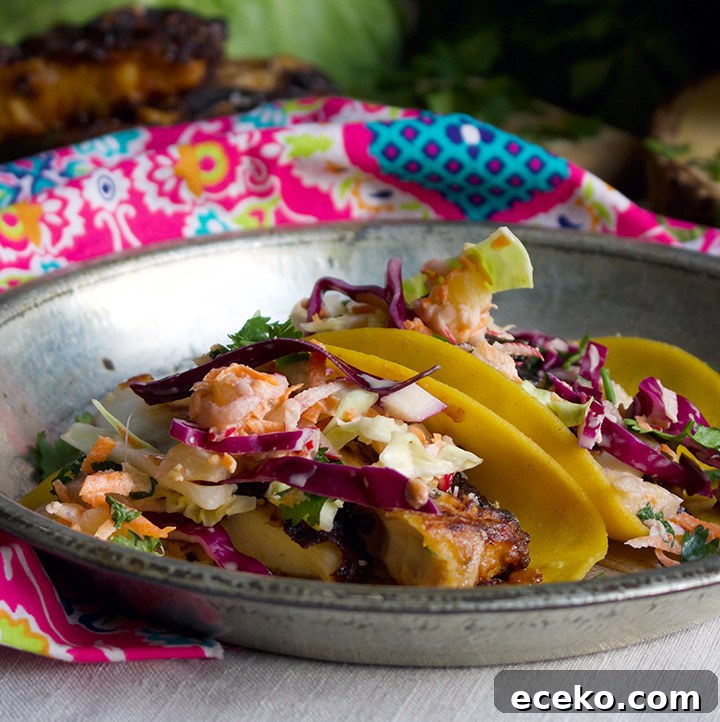 Chili marinated mahi-mahi-mahi fish tacos with pineapple coleslaw.