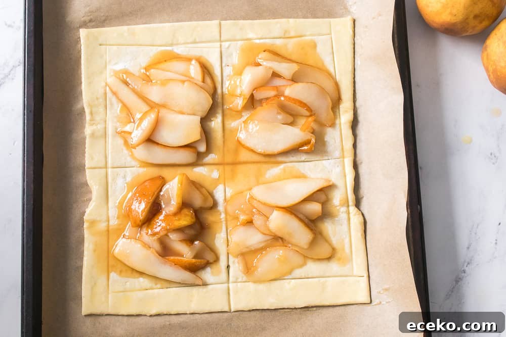 Caramelized Pear & Blue Cheese Tartlets for Entertaining 9 puff pastry topped with caramelized pears