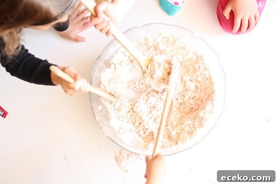 mixing flour and oil in a large bowl