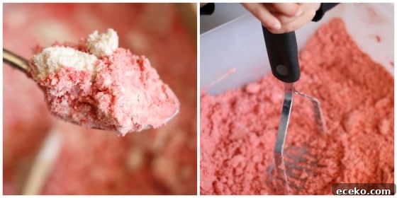 mixing coloured cloud dough with potato masher