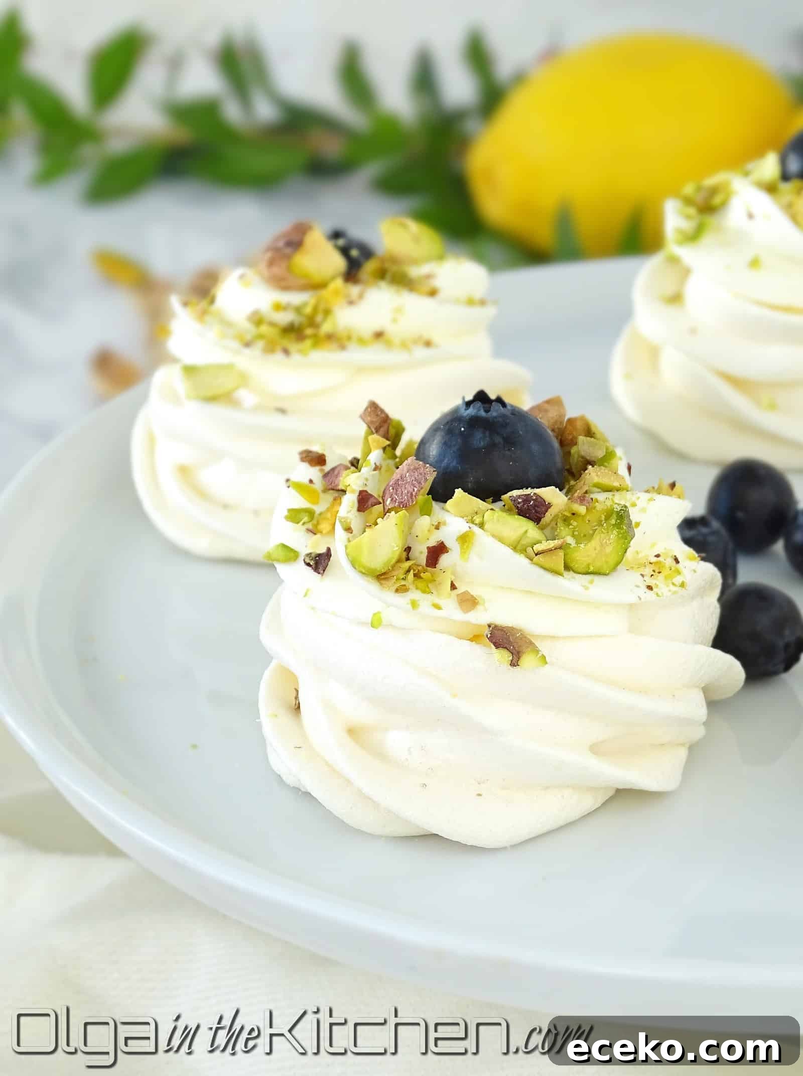 Mini Pavlovas: beautiful, delicious, bite-size dessert for any occasion; crispy on the outside, chewy on the inside. | olgainthekitchen.com