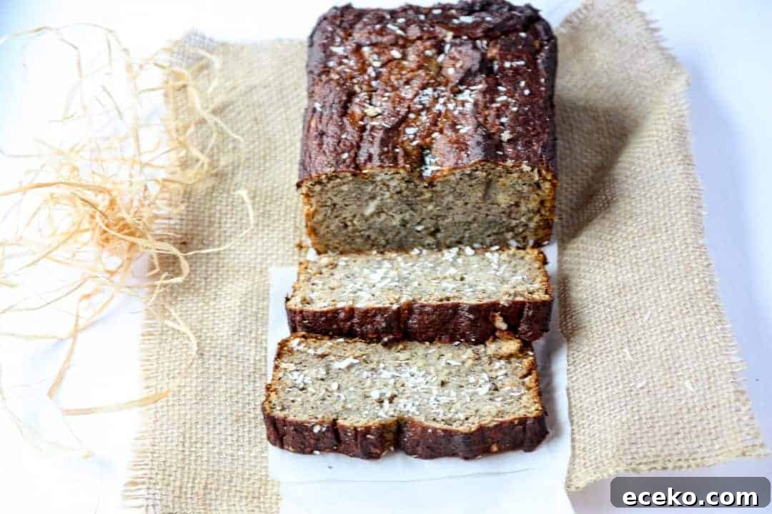 A banana loaf partly sliced