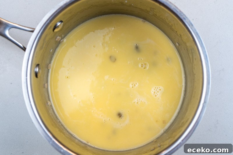 Stirring in the capers & lemon
