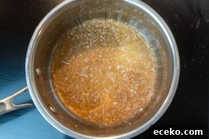 Reducing the wine, vinegar and shallot