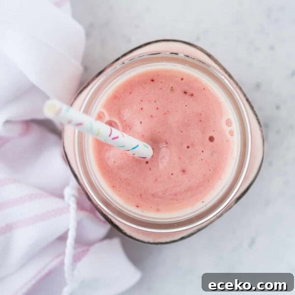 Overhead view of a tropical smoothie.