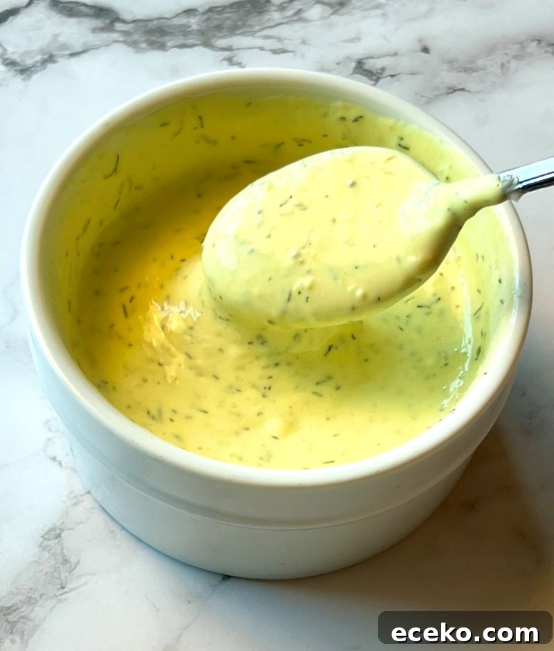 Roasted Cauliflower and Potato Salad with Herb Vinaigrette 4 Mayo and mustard sauce in a small bowl