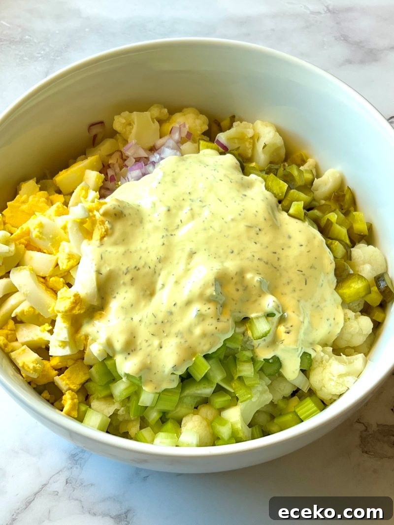 Roasted Cauliflower and Potato Salad with Herb Vinaigrette 6 Bowl of mixed salad ingredients