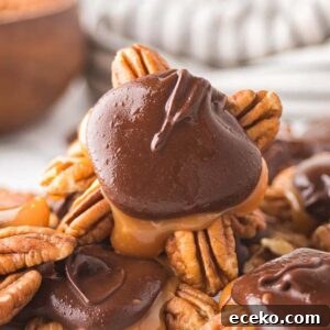 How to Make Classic Homemade Turtle Candies at Home 13 Close-up of homemade turtle clusters featuring chocolate-covered pecans with gooey caramel, stacked enticingly on top of each other.