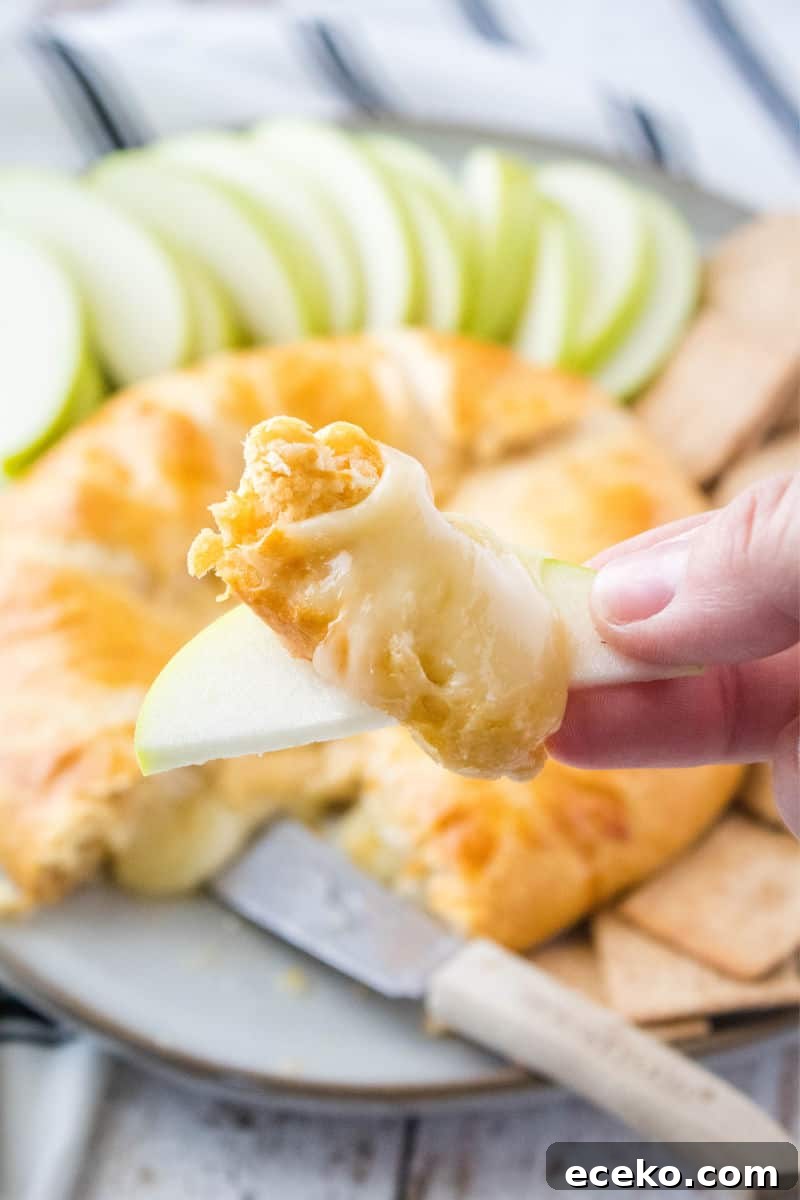 baked brie on an apple slice