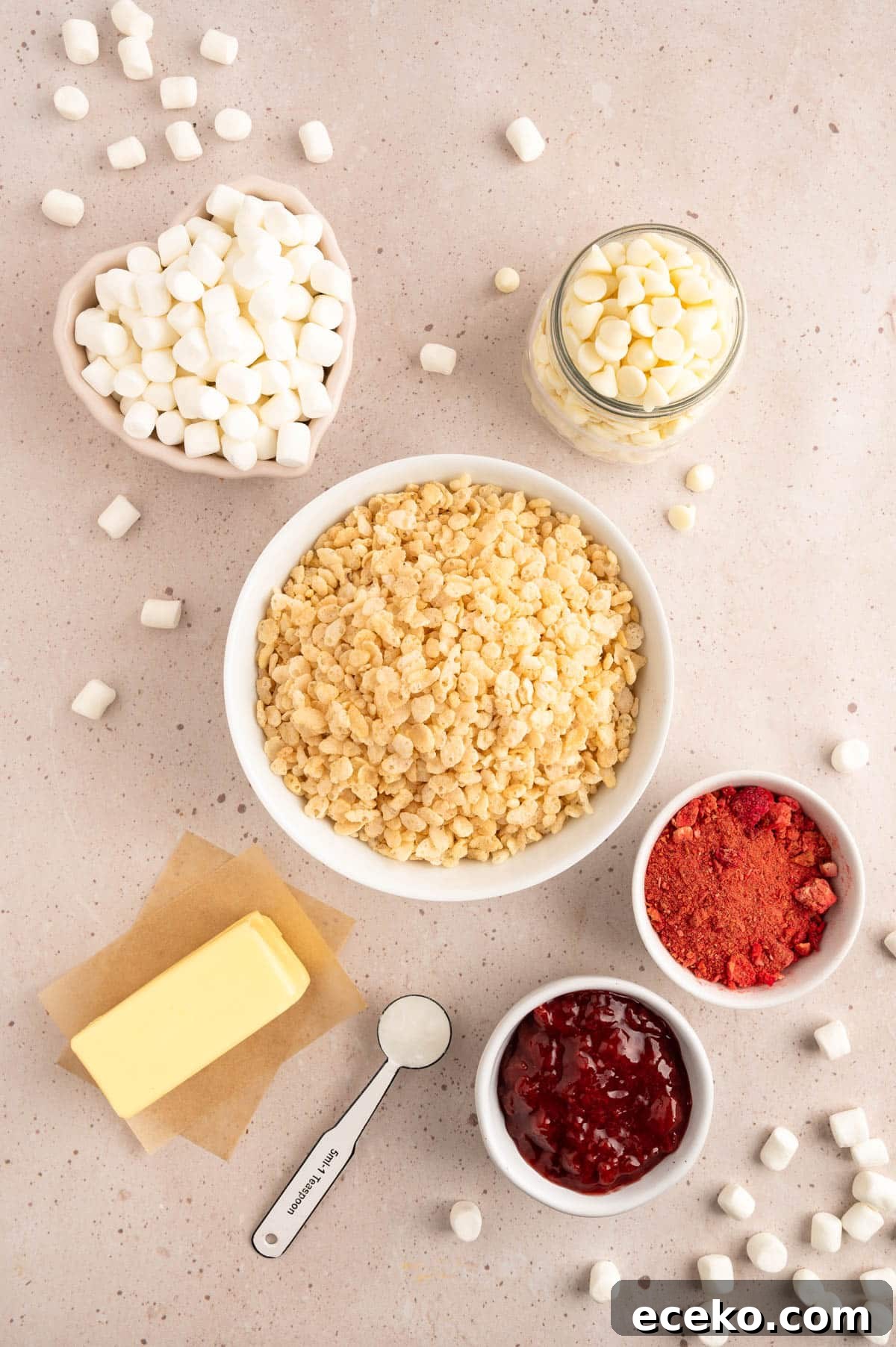 Strawberry Rice Krispie Treats Recipe for Fresh, Fruity Squares 3 overhead photo of ingredients needed to make strawberry rice krispie treats in bowls