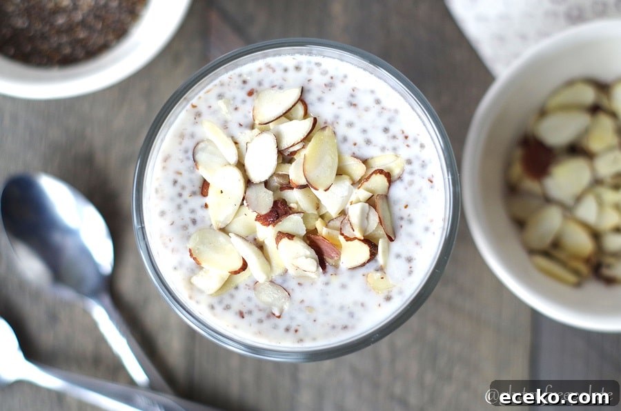 top down view of overnight paleo porridge in a class bowl with sliced almonds.