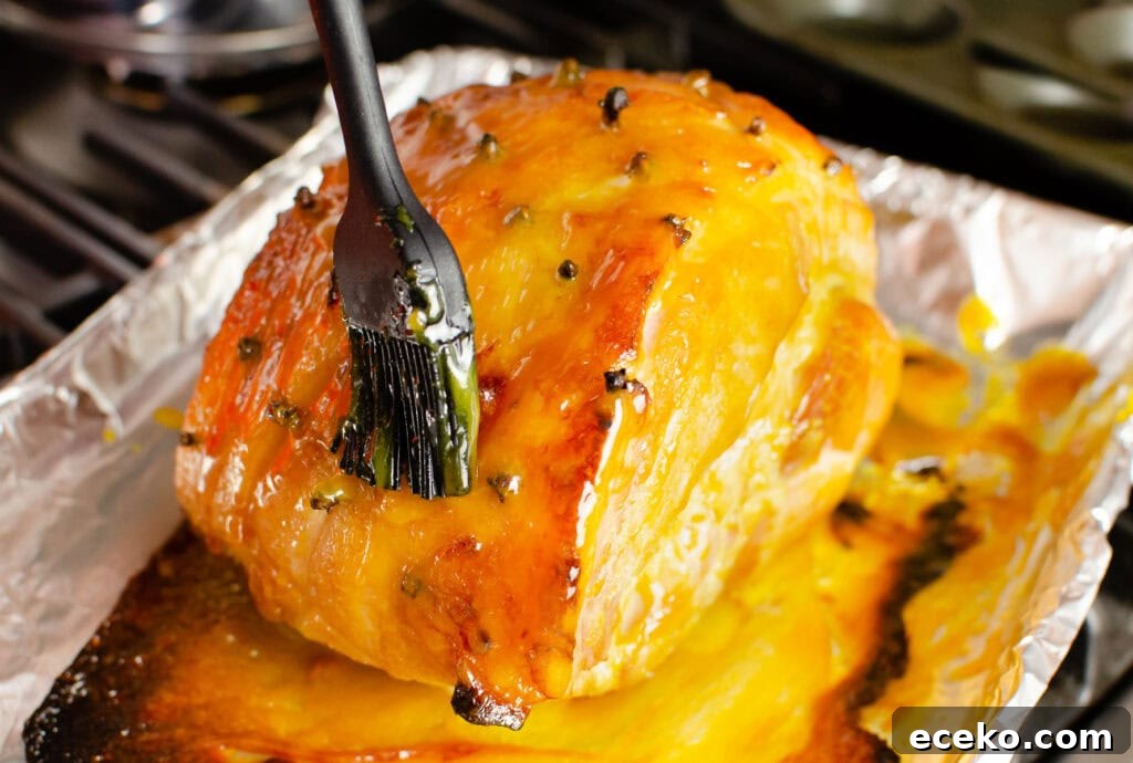 Honey-Glazed Roast Gammon Joint Recipe 25 Re glazing the top of the ham joint with a black rubber brush