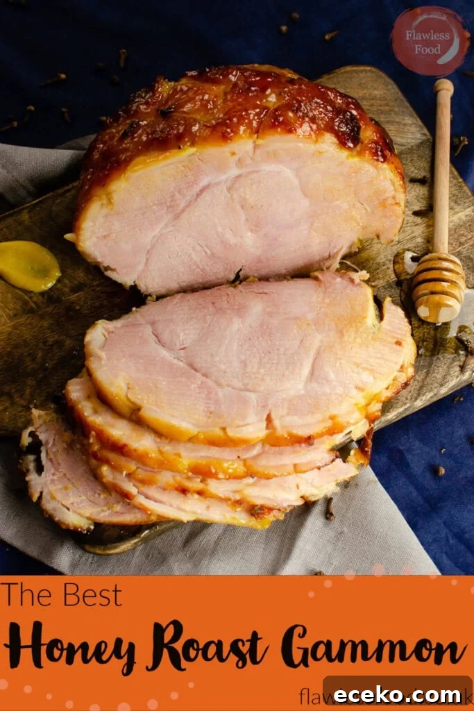Honey-Glazed Roast Gammon Joint Recipe 28 Pin image of our Honey Roast gammon on a wooden board with three slices cut from it with a honey stick coated in honey and a dollop of mustard on the sides