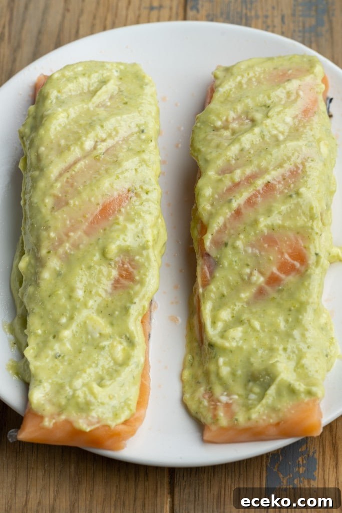 coating salmon with pesto butter