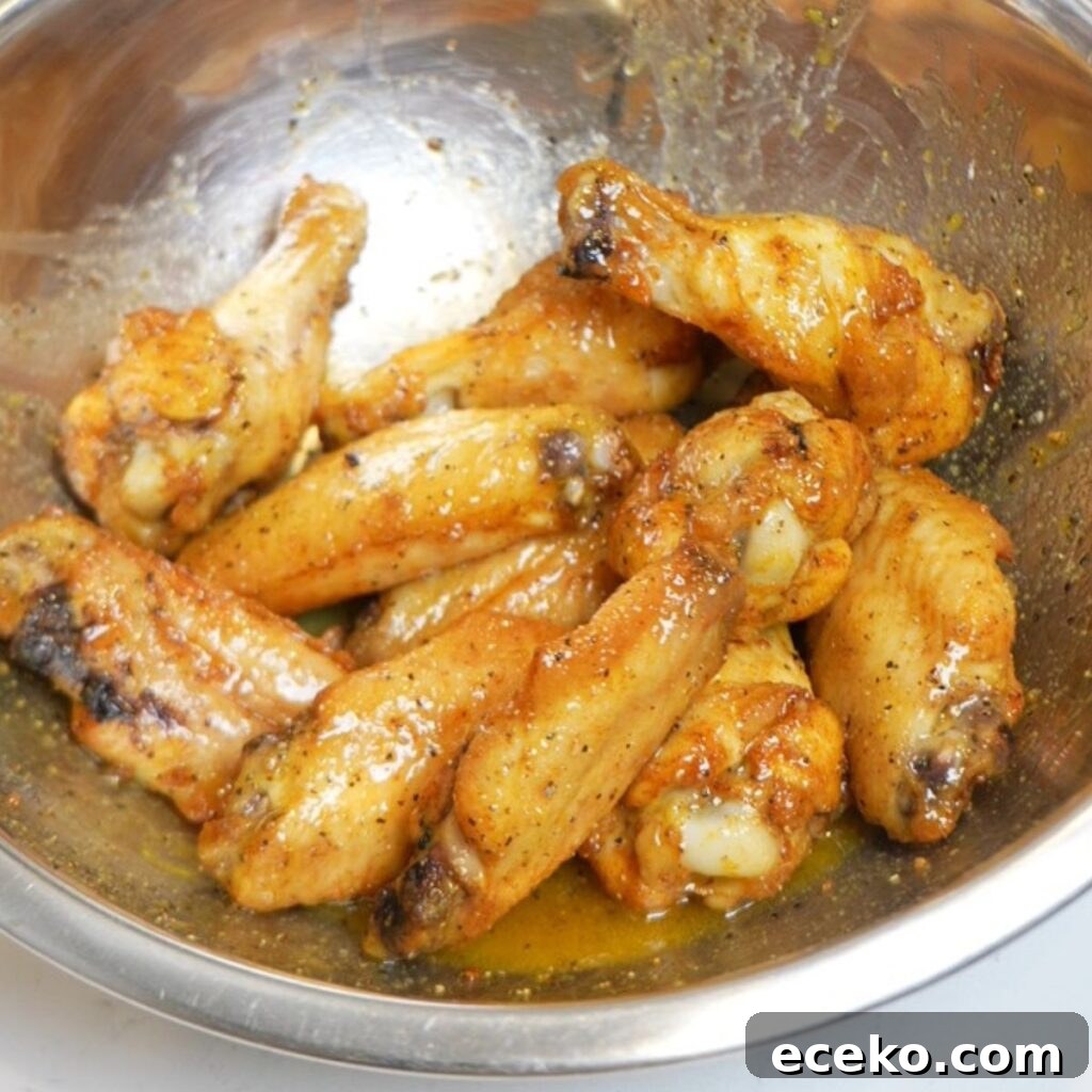 Wings tossed with lemon pepper sauce.