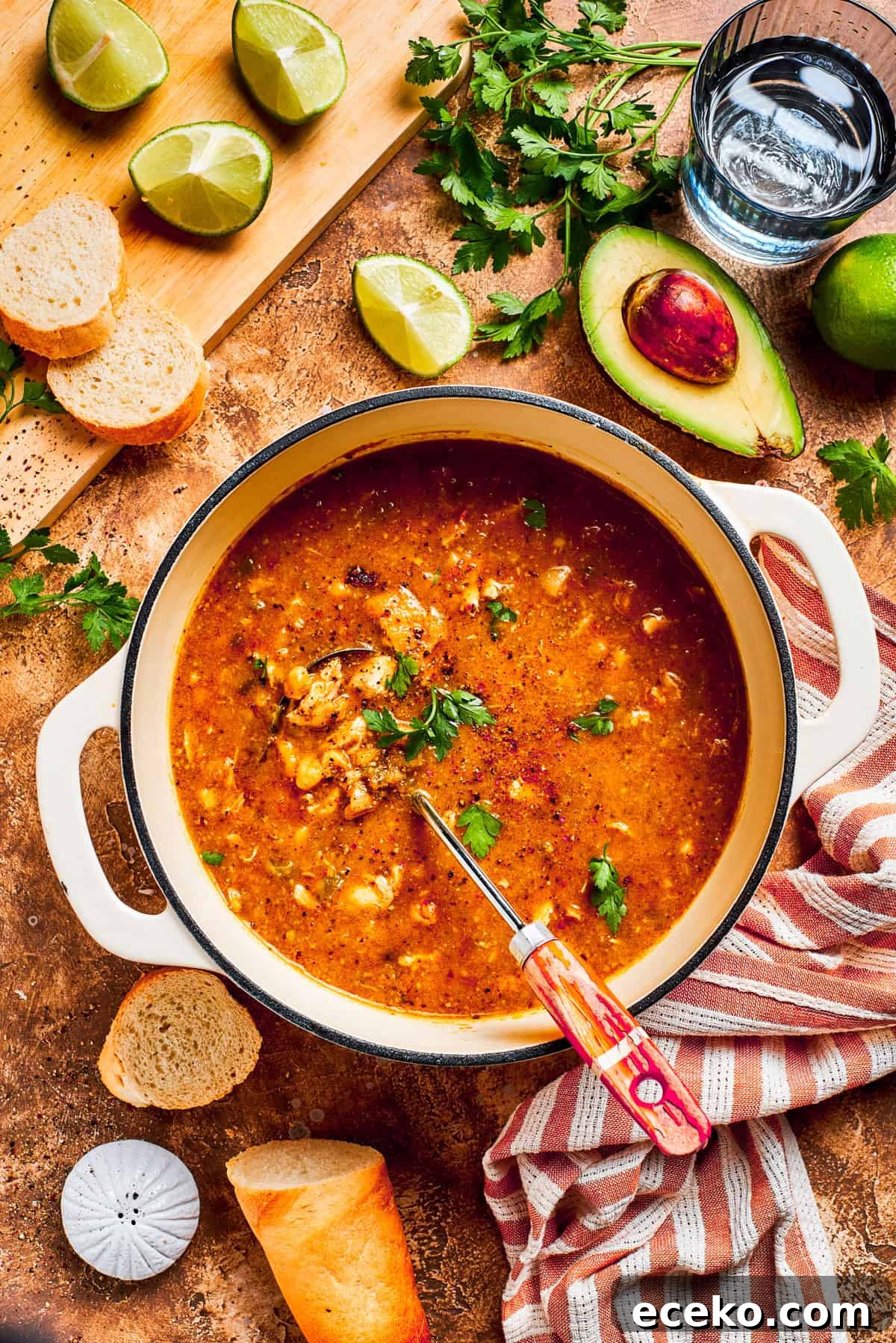 Simmer until flavors meld. A pot of spicy chicken soup.