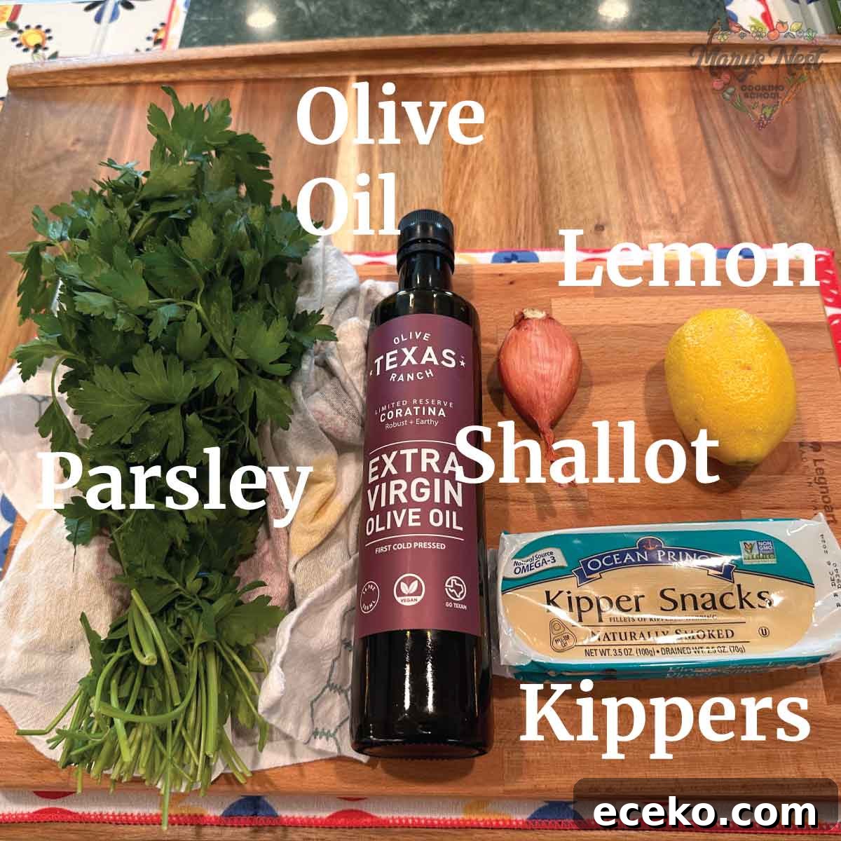 Kippers Recipe Ingredients showing parsley, olive oil, lemon, shallot, and kippers.