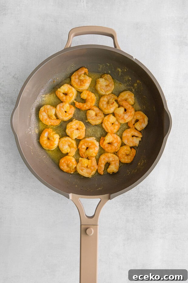 Fried shrimp in a skillet. 