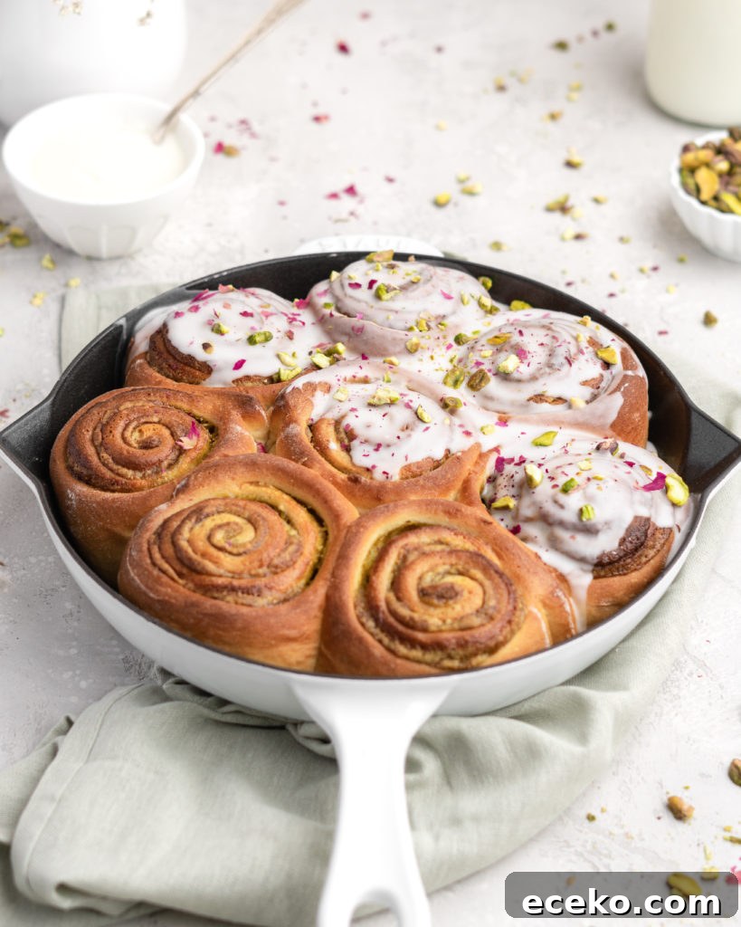 Buttery rich brioche dough is smothered in a creamy, nutty pistachio paste in these Cardamom Pistachio Rolls