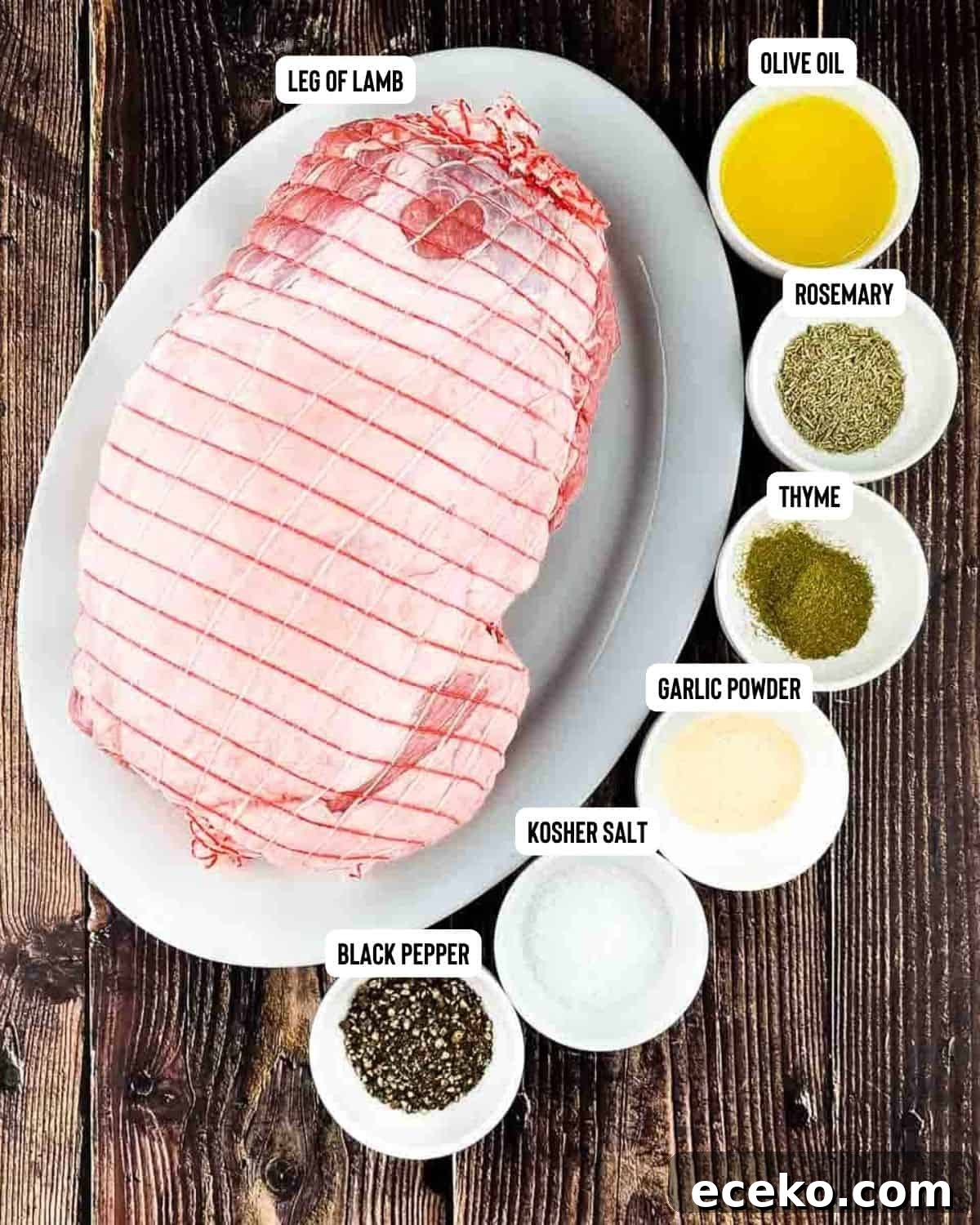 Boneless Smoked Leg of Lamb on a Pellet Grill — Tender Recipe 3 The ingredients for leg of lamb measured and placed on a wooden table.