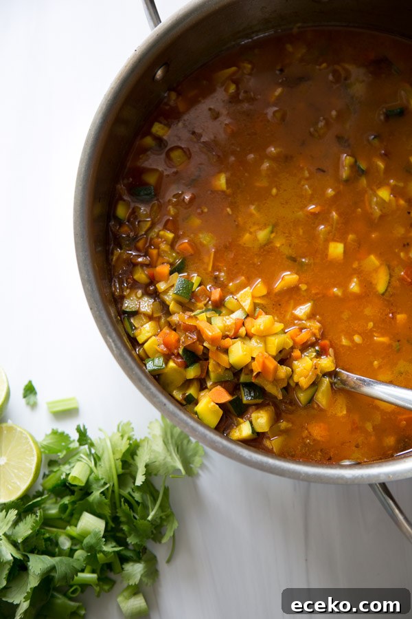 Vegetable Detox Soup in a pot with spoon