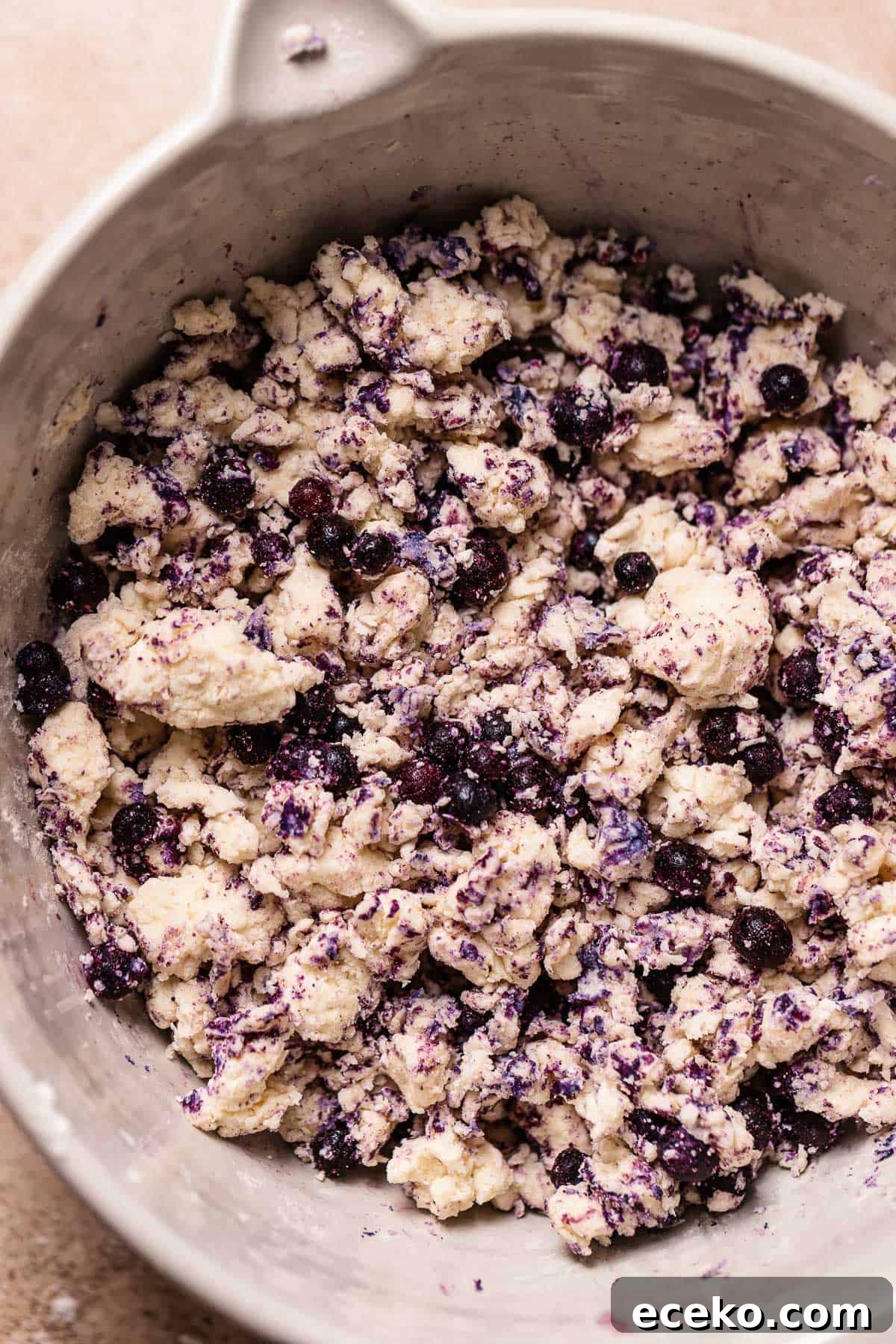 A mixing bowl with the blueberry scone dough.