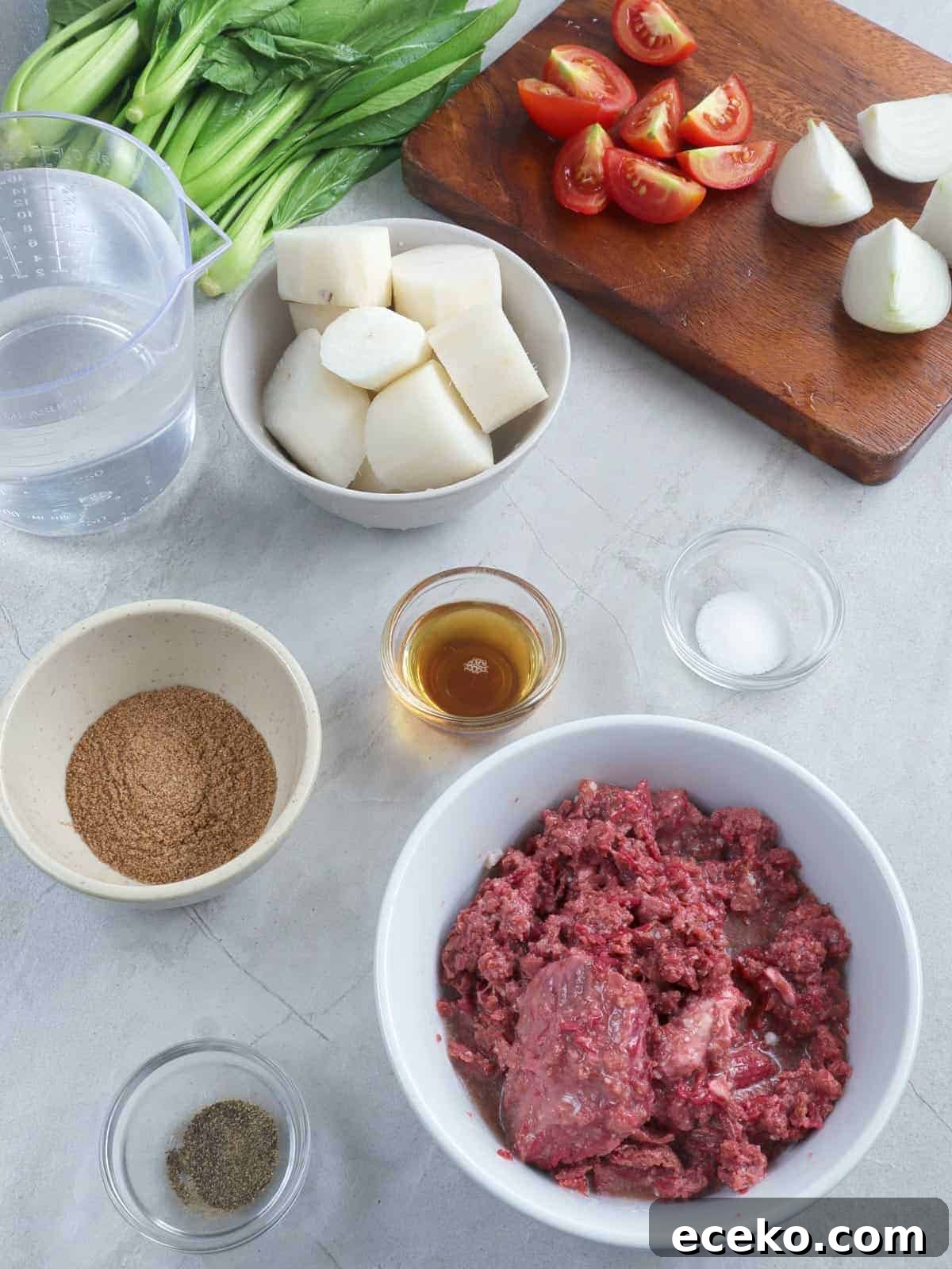 corned beef, radish, tomatoes, bok choy, tamarind powder, fish sauce, chopped tomatoes