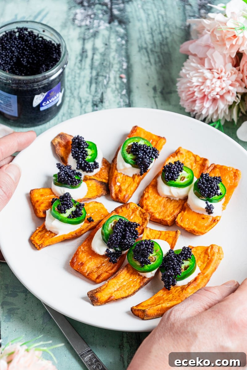 Crispy Air-Fryer Sweet Potato Canapés Topped with Caviar 4 Plate of sweet potato canapes