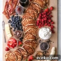A finished "build your own" pancake board with all the delicious toppings and additions