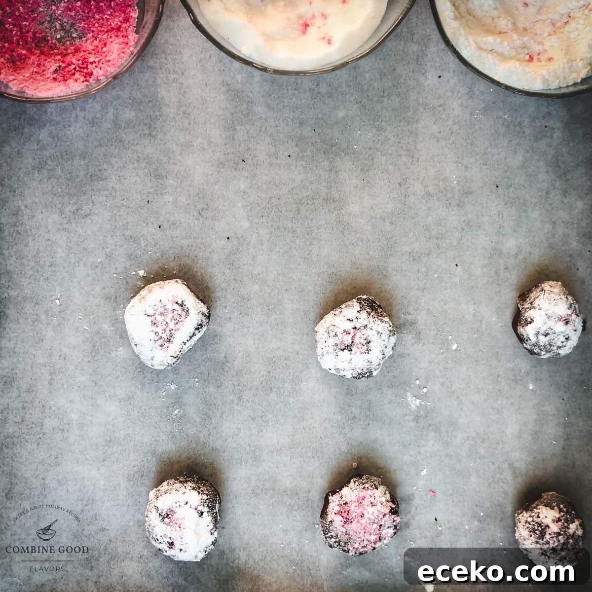 Chocolate Peppermint Crinkle Cookies Recipe for the Holidays 17 Sugar candy cane covered dough balls on a baking sheet lined with parchment paper.