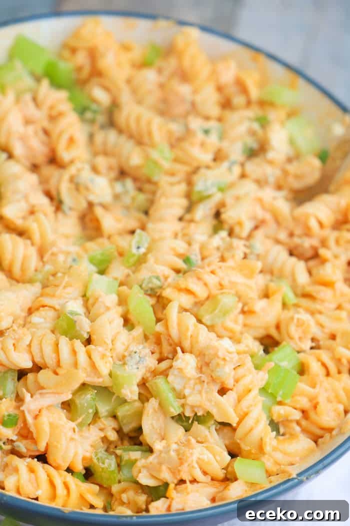 Buffalo Chicken Pasta Salad in a large blue bowl