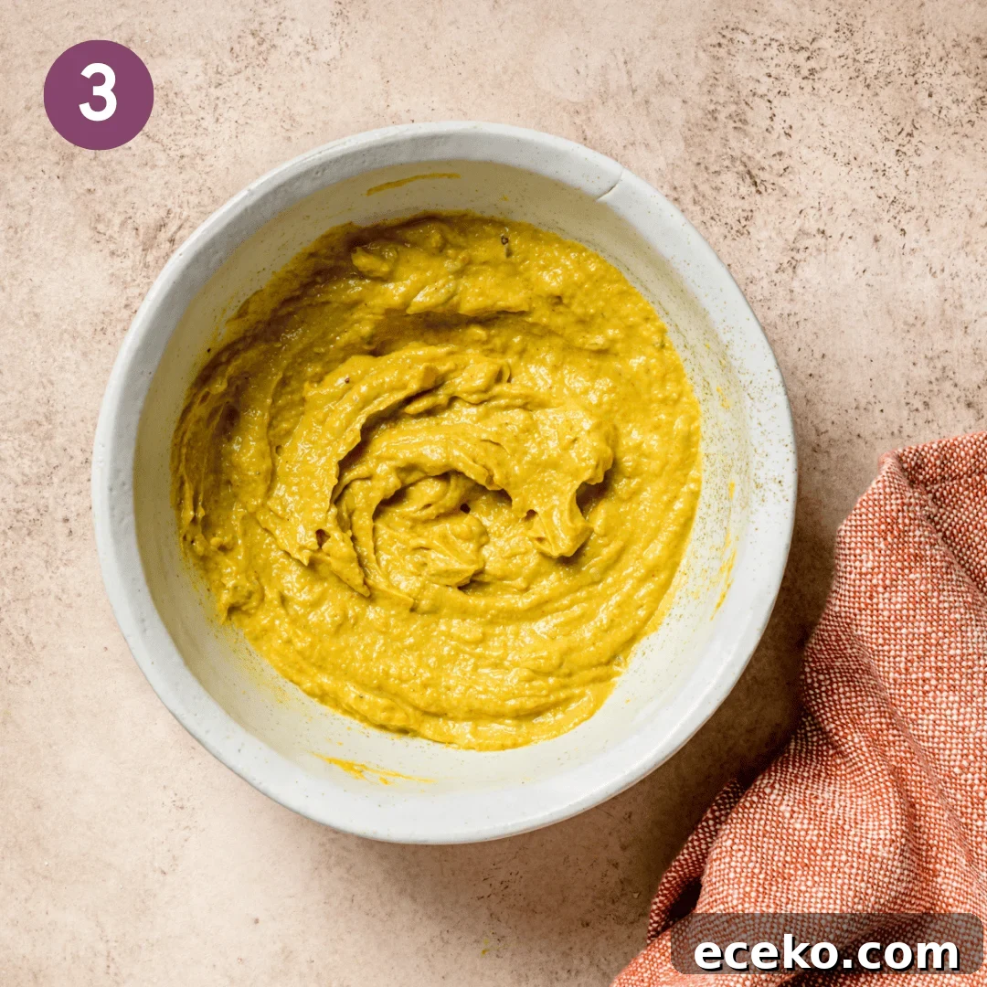 egg salad sauce in a small bowl after being combined.
