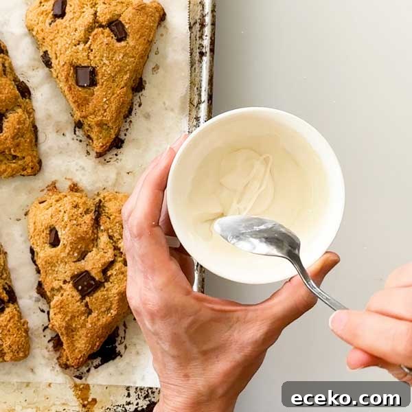 Pumpkin Cottage Cheese Scones with Chocolate Chunks 15 Mixing the powdered sugar and milk together in a bowl.