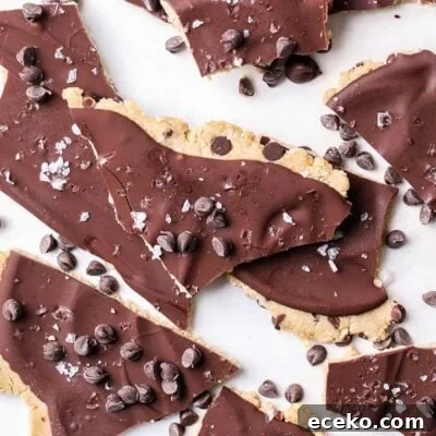 Protein cookie dough bark broken into smaller pieces.