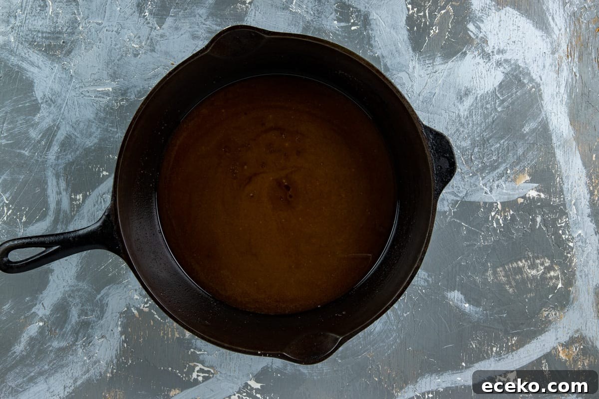 Melted butter in cast iron skillet.