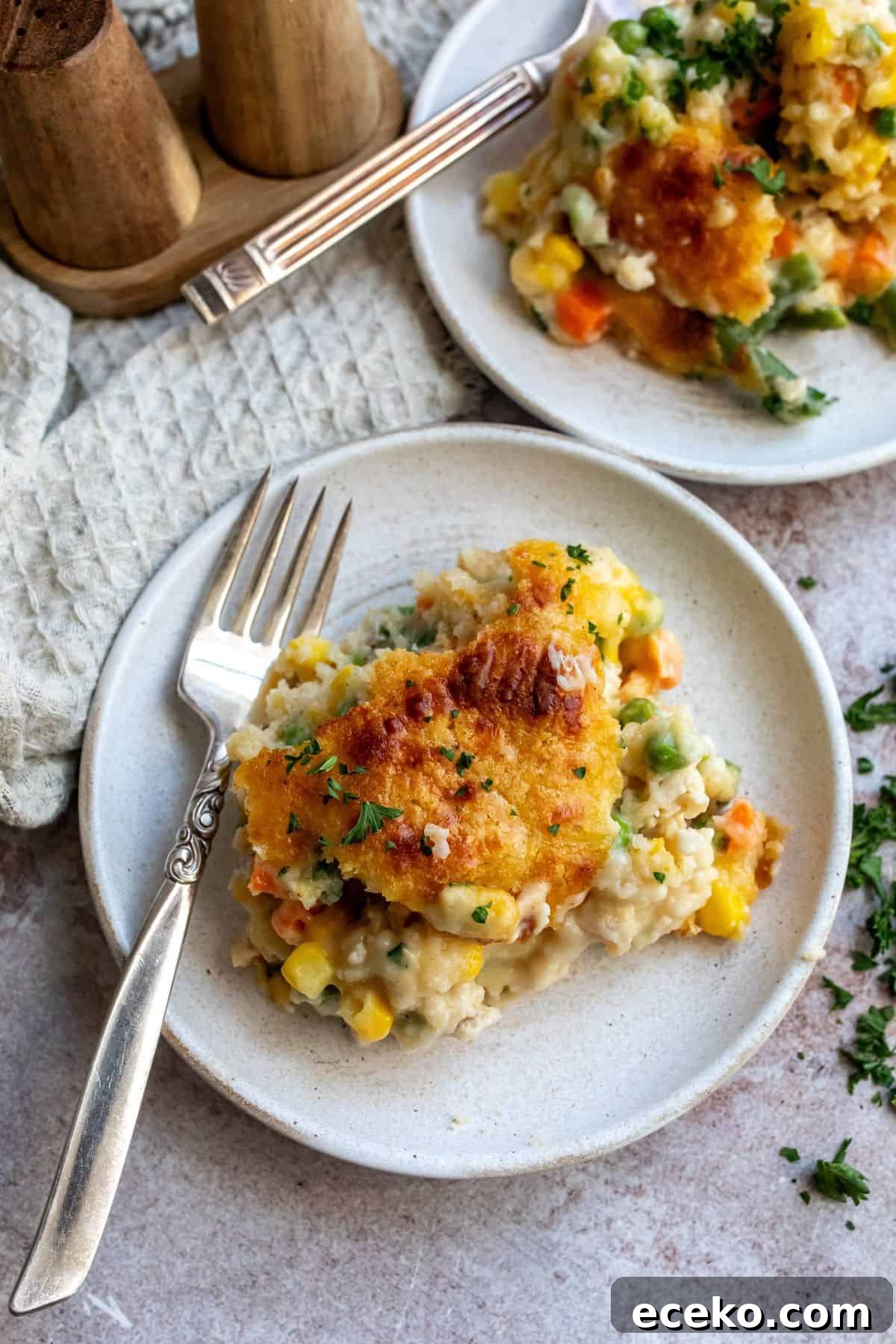An image of a slice of chicken cobbler on a plate.