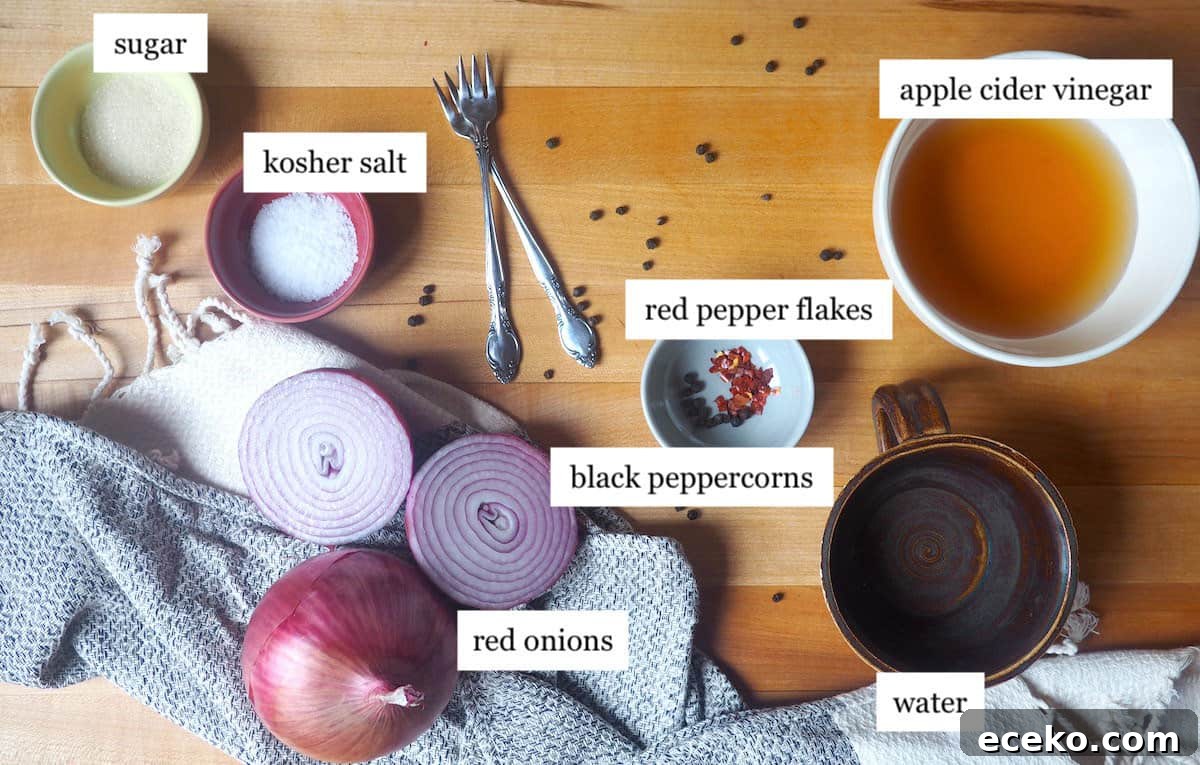 Quick Pickled Red Onions Recipe for Toppings & Salads 3 The ingredients in pickled red onions laid out and labeled.
