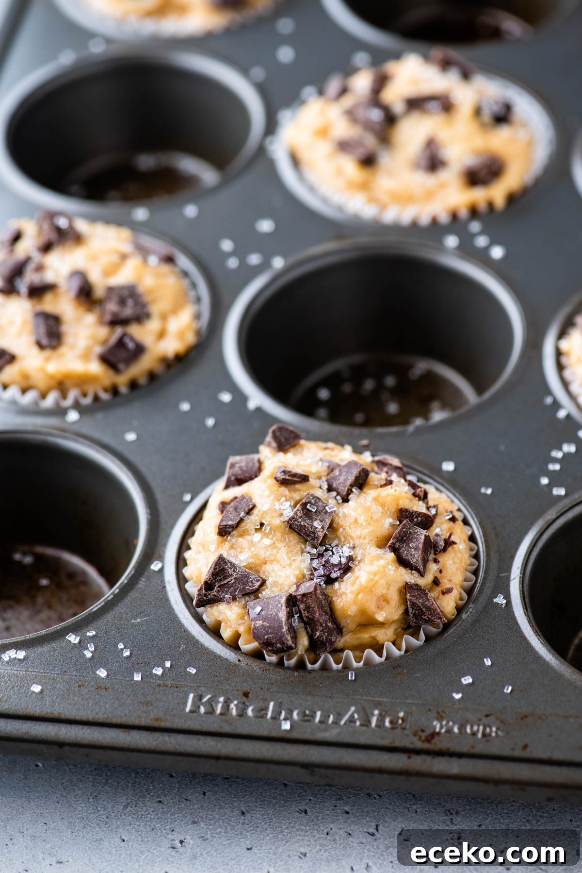 peanut butter muffin batter in muffin pan