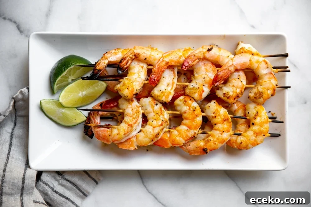 Vietnamese Cold Rice Noodle Salad with Garlicky Shrimp Skewers 7 Grilled shrimp skewers on a platter.