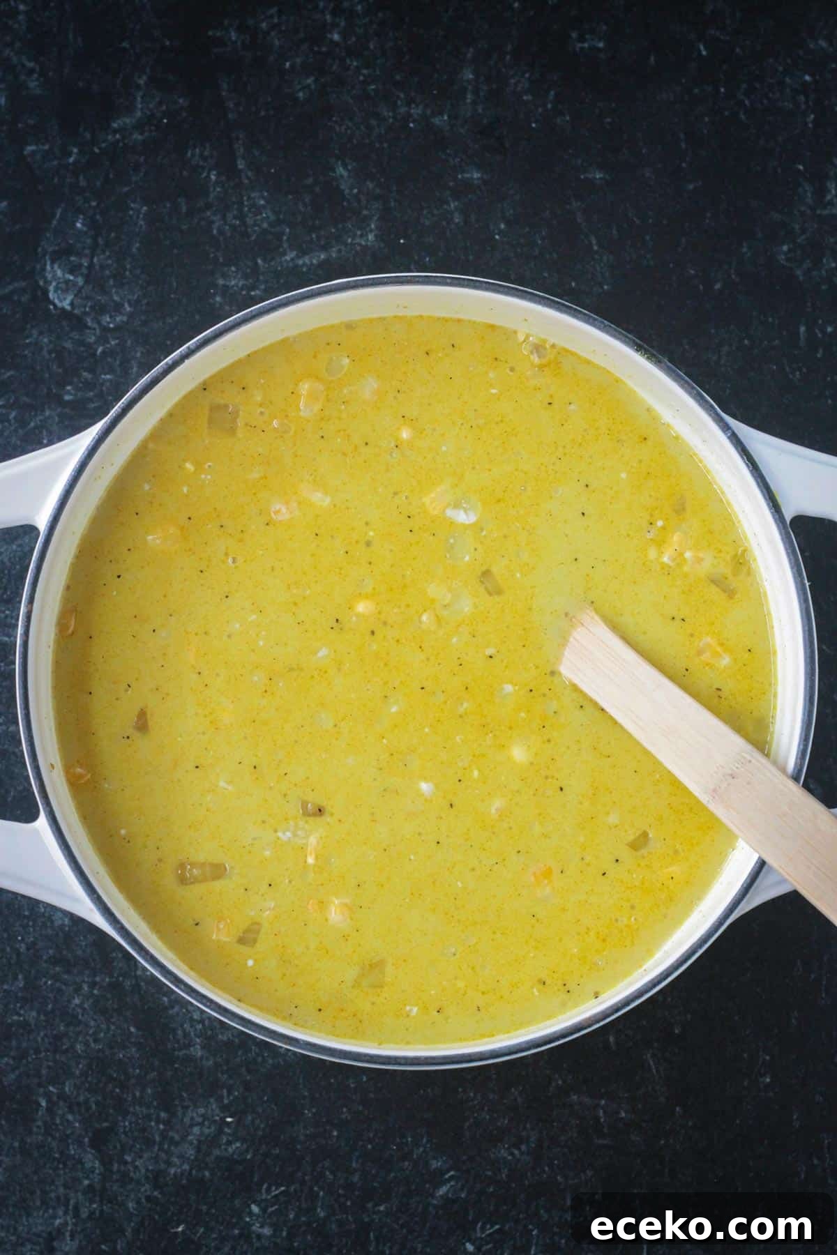 Creamy Coconut Curry Corn Soup Recipe 6 All recipe ingredients in a pot.