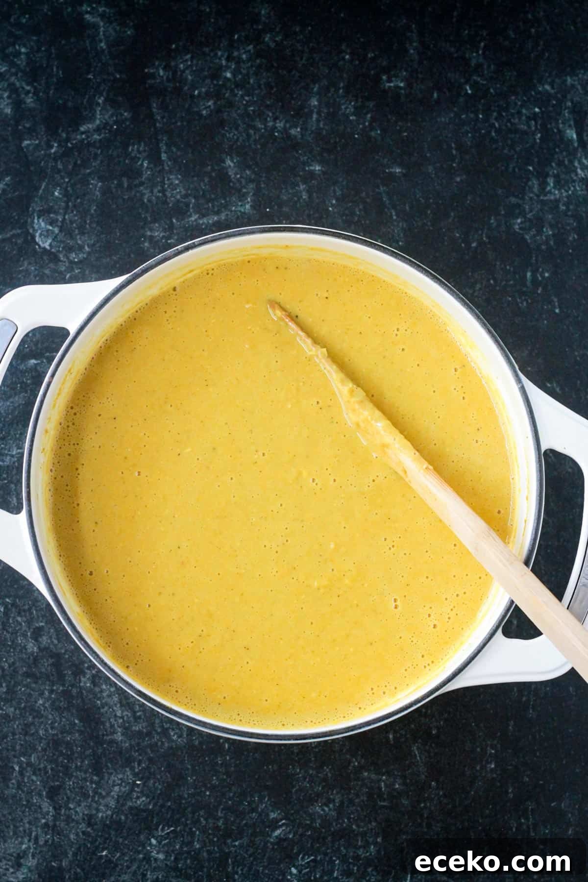 Creamy Coconut Curry Corn Soup Recipe 8 Creamy puréed corn soup in a pot.