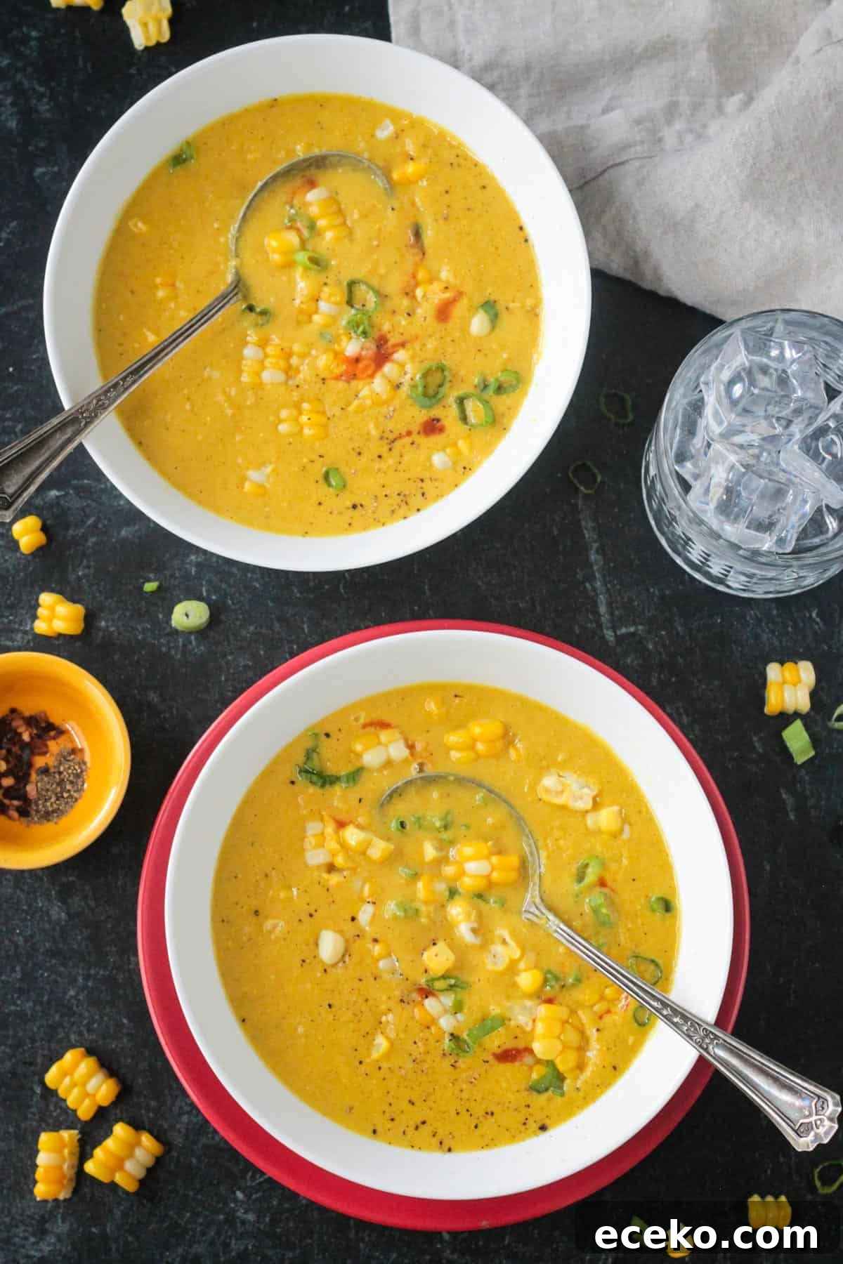 Creamy Coconut Curry Corn Soup Recipe 10 Two bowls of creamy curried corn soup.